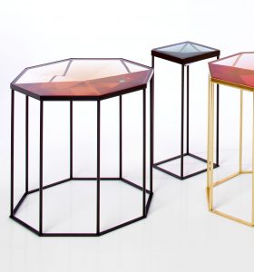 Faceted Tallis table cast in Gold Quartz resin on black powder coated cage-like base/frame.
