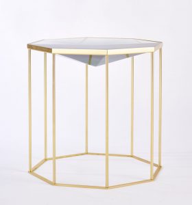 Faceted Tallis table cast in Siberian Green resin on brass cage-like base/frame.