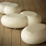 Oval low coffee table cast in white scagliola resembling marble. Double asymmetric version available.