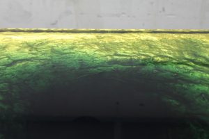 Abyssus 2 is a cast multi-coloured resin coffee table with a gilded textured core